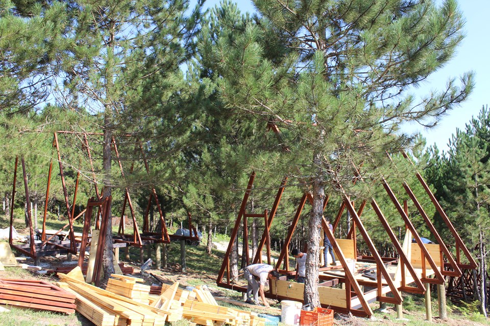 Multiple Stella 38 structures during assembly in 2019.