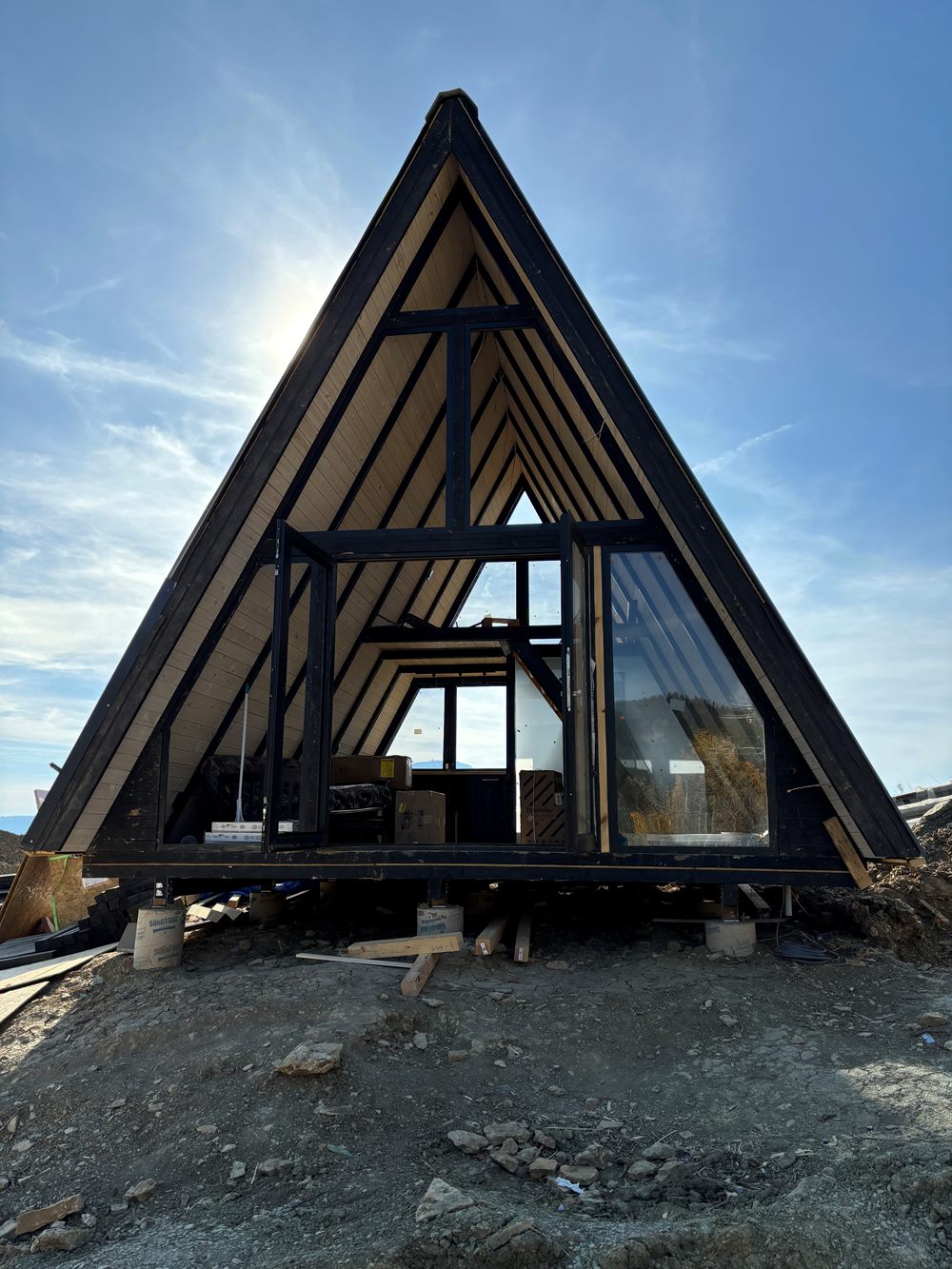 Front structural frame of a Stella 53 A-frame cabin during owner-led assembly in Island Park, ID.