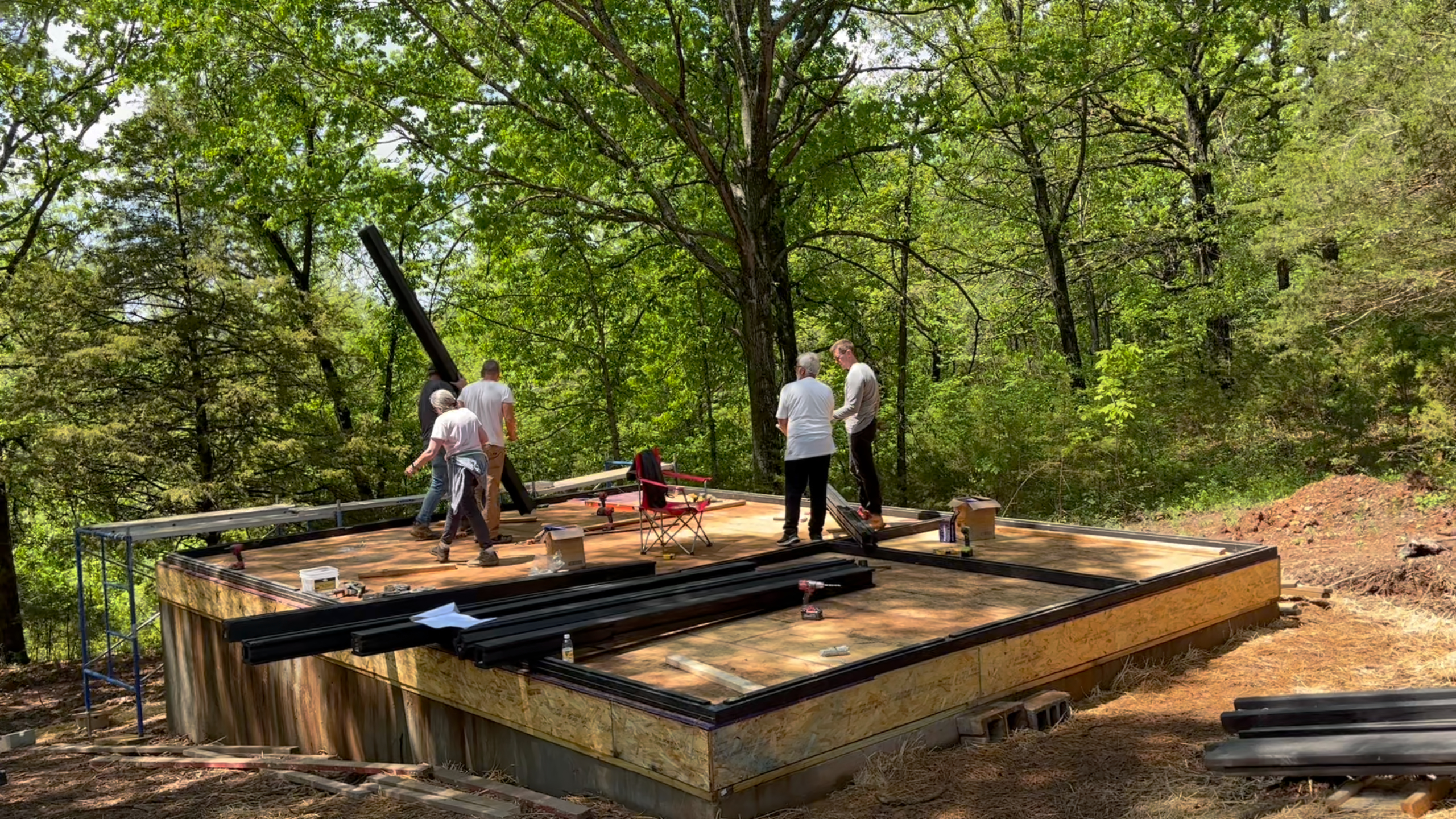 Ground-floor timber frame assembly during the Arkansas Aries 96 build.