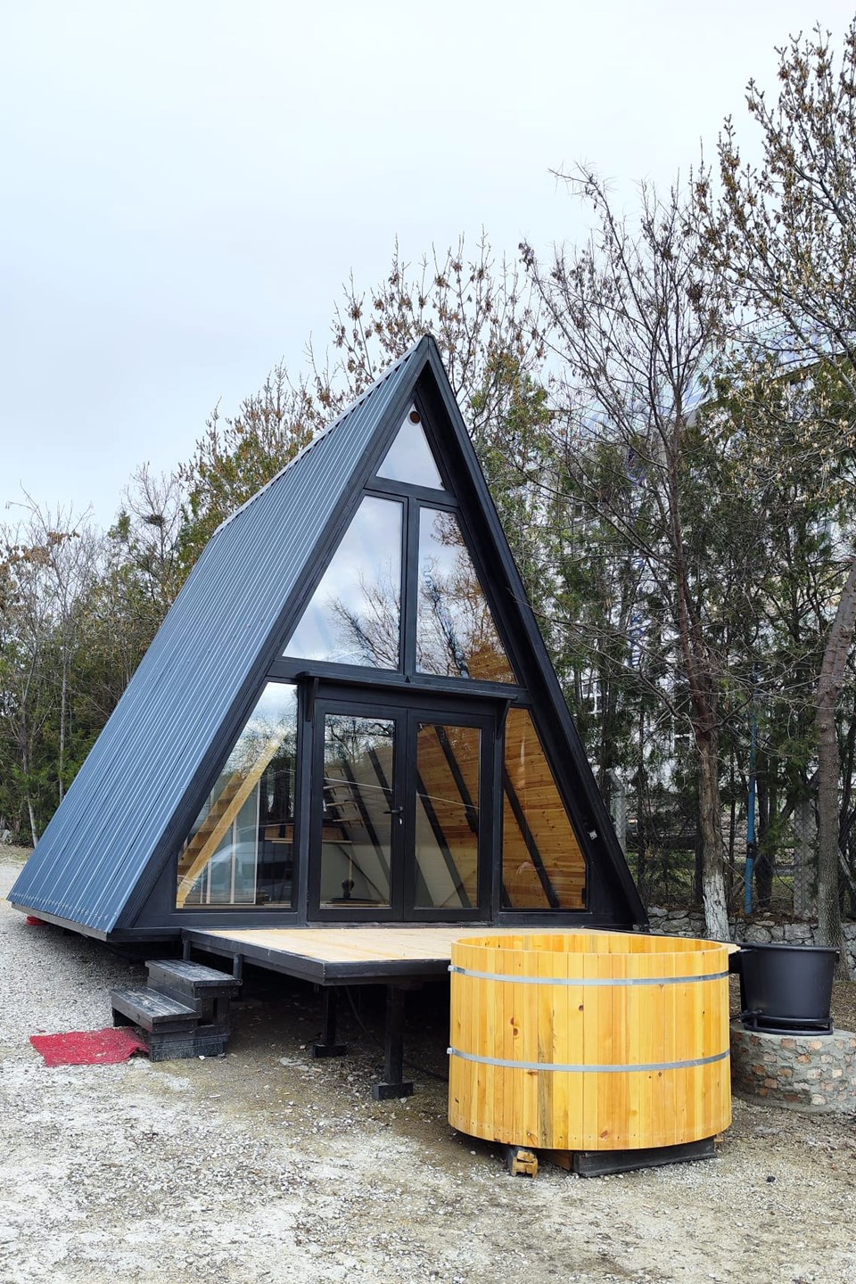 Front facade of the completed Stella 53 prototype with glazing and deck in Turkey