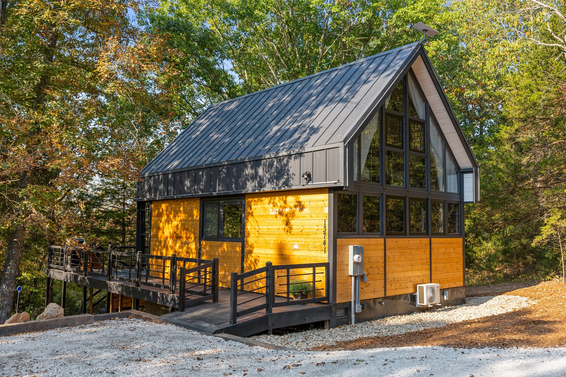 Completed side and rear exterior of the Aries 96 cabin in Omaha, Arkansas.