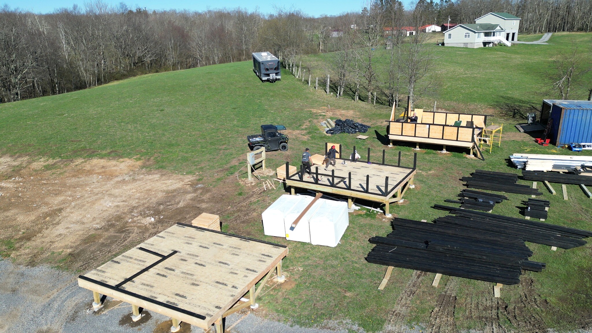 Floor platforms and wall frames prepared for three Stella 70 A-frame cabins at WV ATV Resort