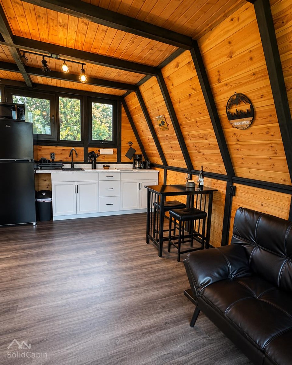Living area beneath the loft in an earlier West Virginia cabin.
