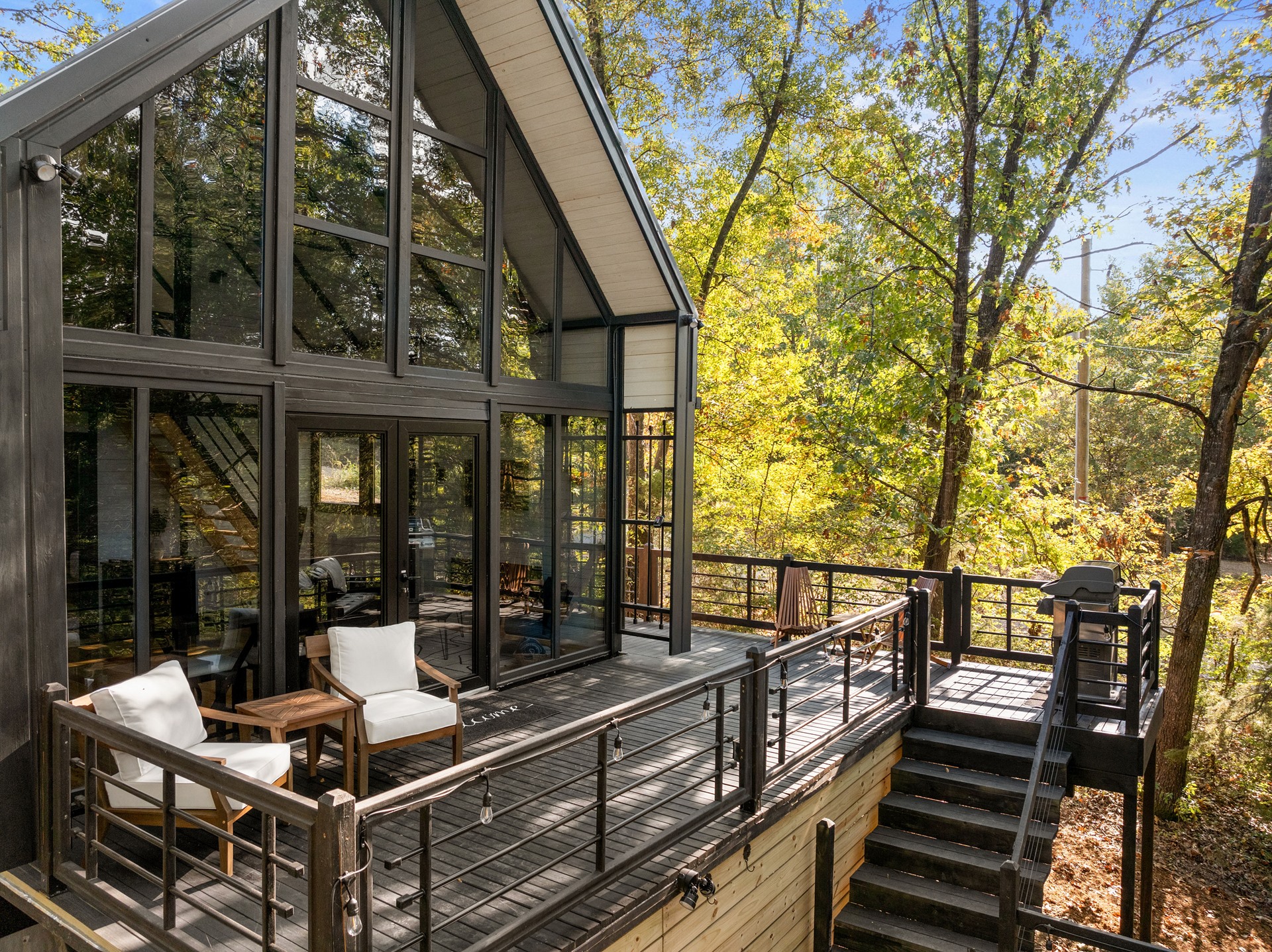 Completed front deck and stairs at the Aries 96 cabin project in Omaha, Arkansas.