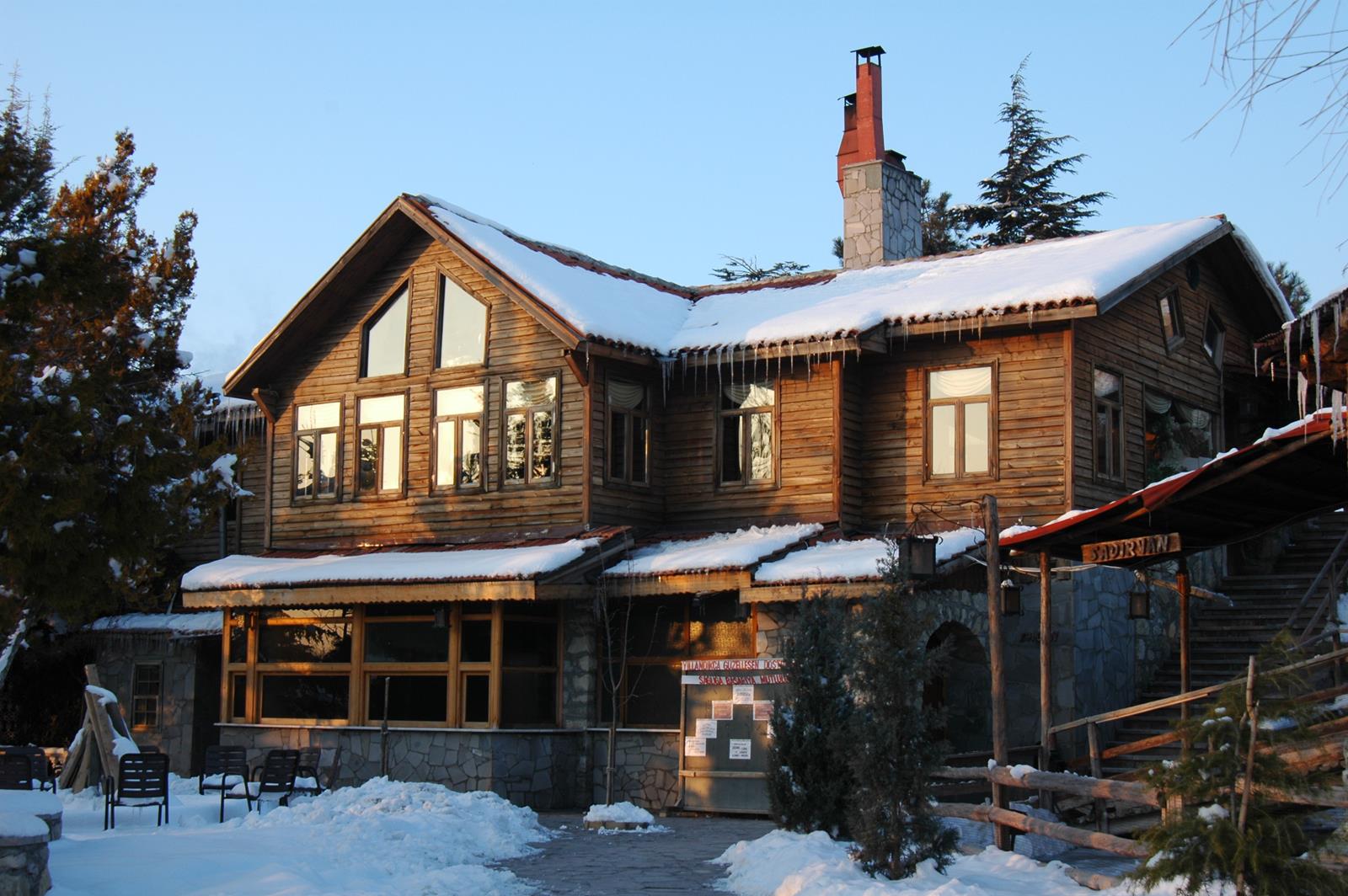 Wooden building built by MasifEv before the company expanded into factory-prepared cabin kits