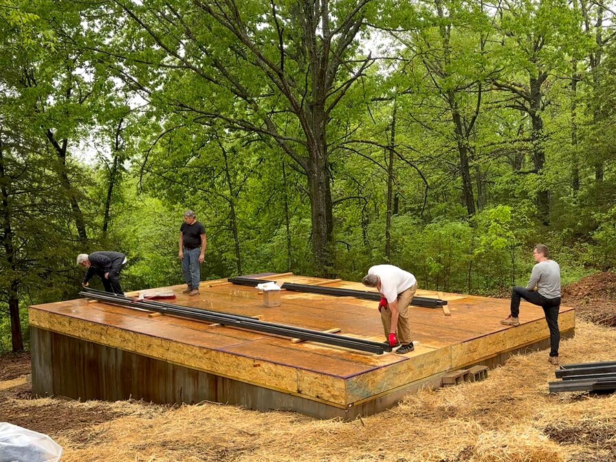 Aries 96 crawl-space foundation and floor platform on the sloped site in Omaha, Arkansas.