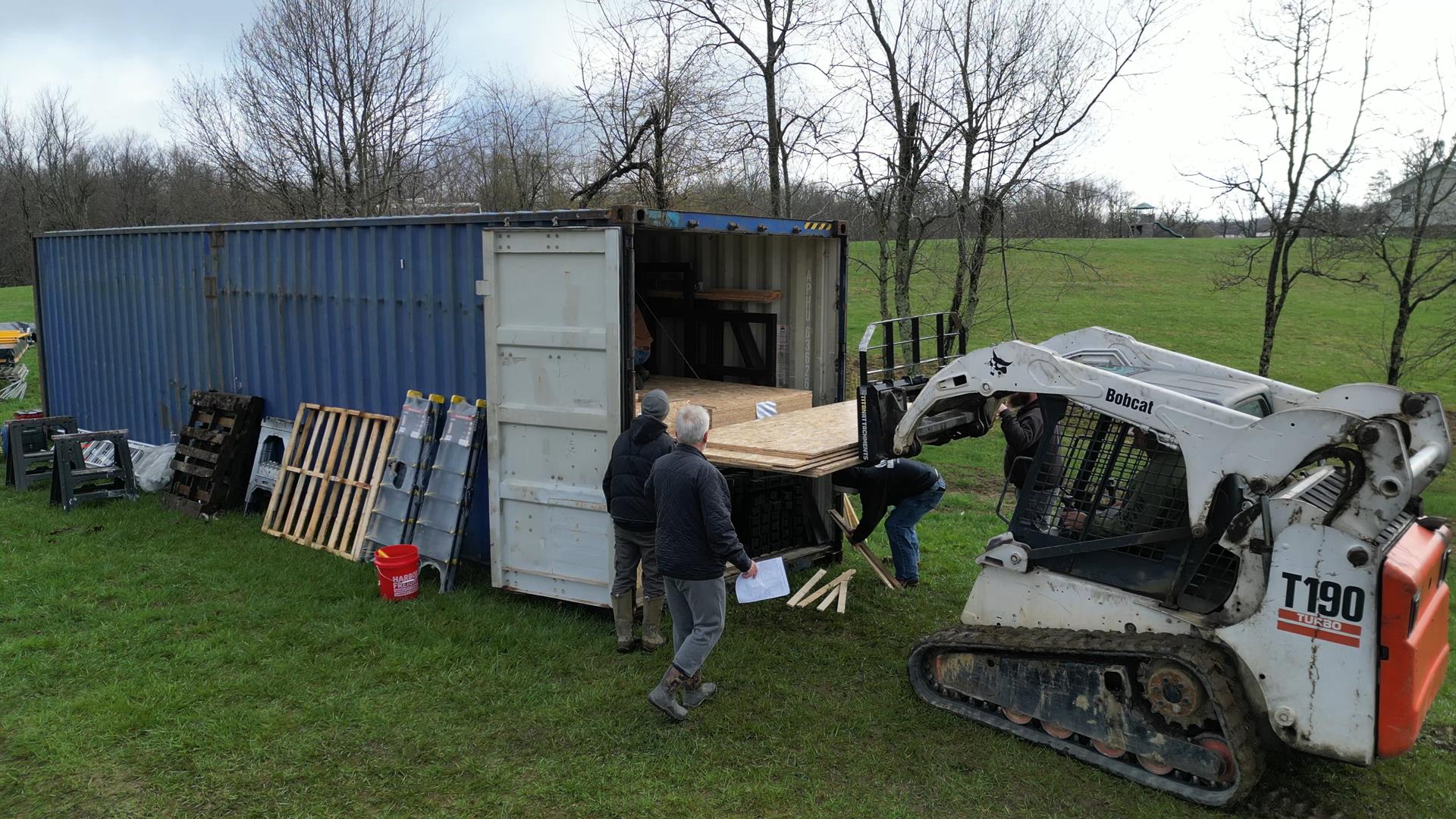 How Is a Cabin Kit Delivered? Container, Customs and Site Unloading