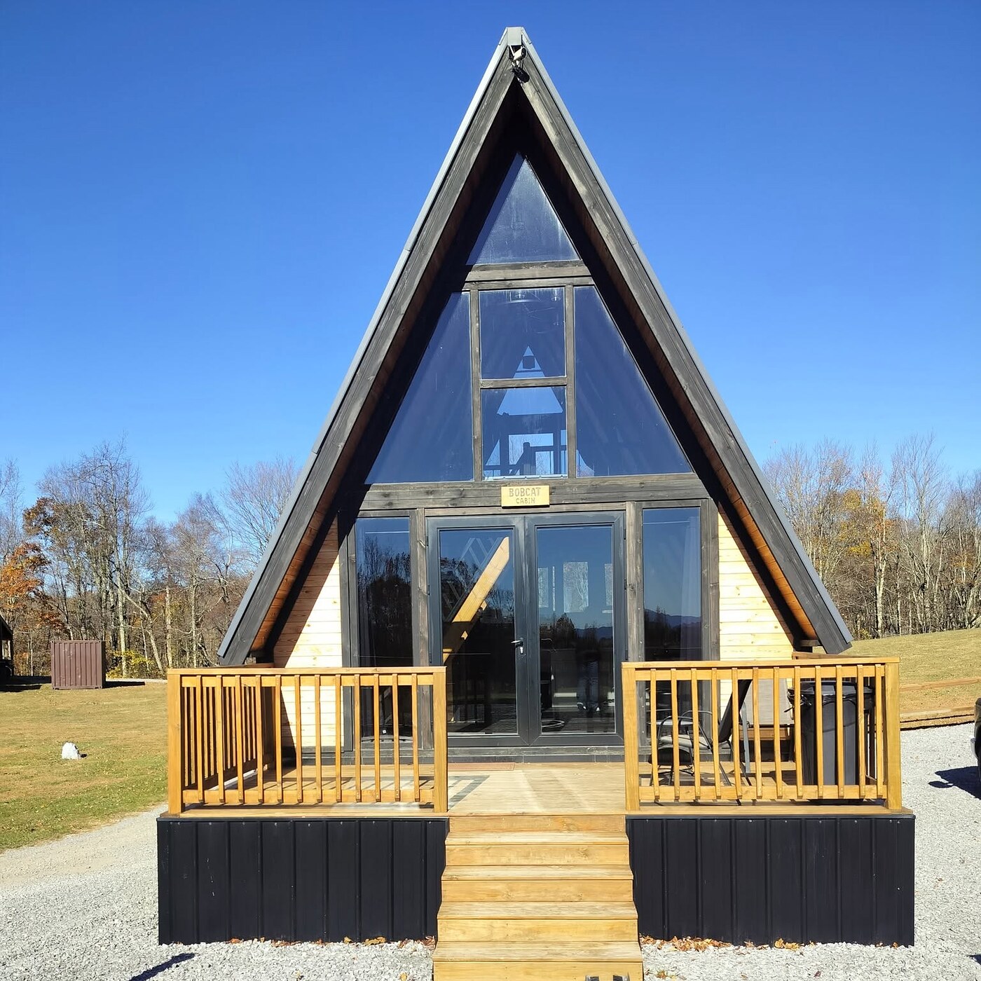 Front view of a completed Stella 70 A-frame cabin at WV ATV Resort.