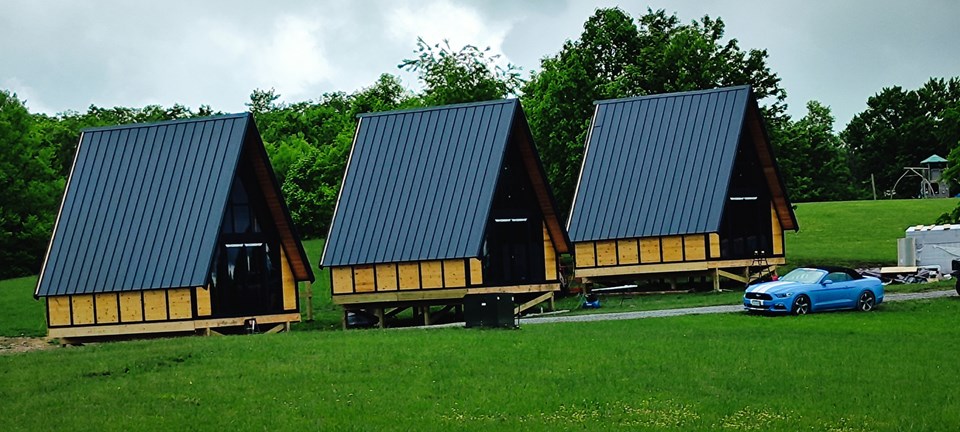 The aligned cabin shells ready for the owner's local interior and site-finishing work. West Virginia / Earlier configuration.