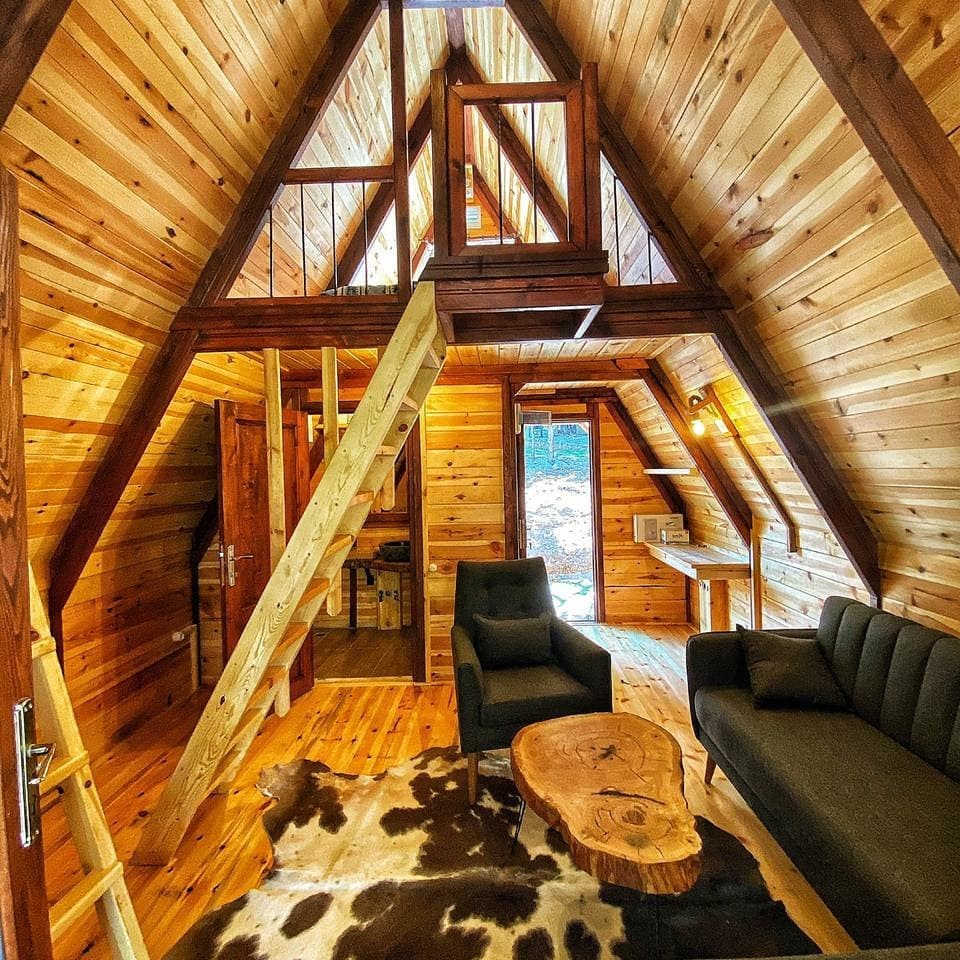 A furnished Stella 38 interior, with living space below the loft.
