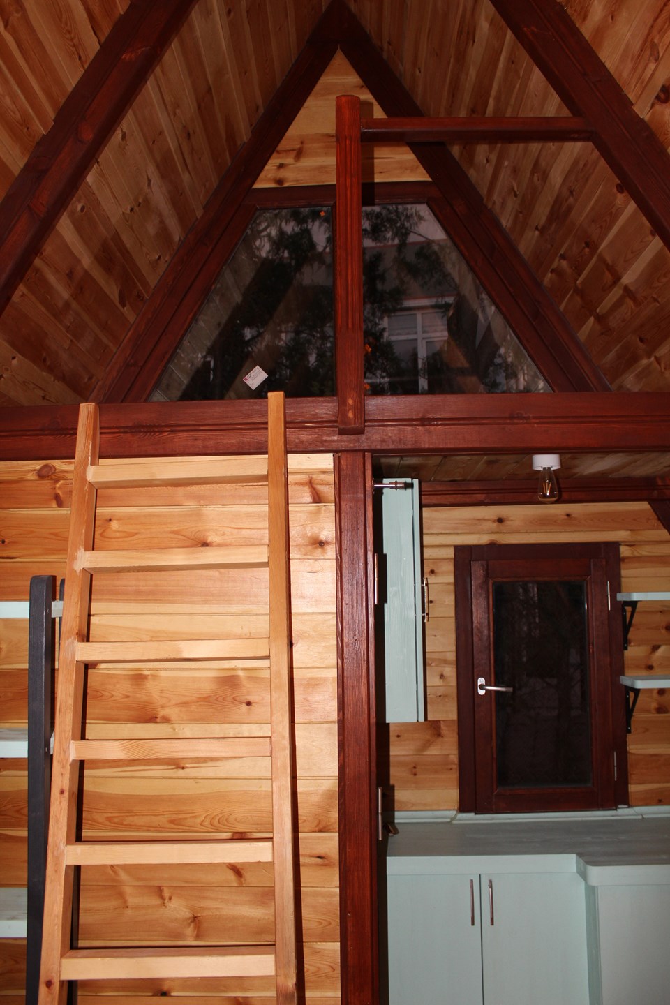 The early Stella interior, with a ladder leading to the sleeping loft.
