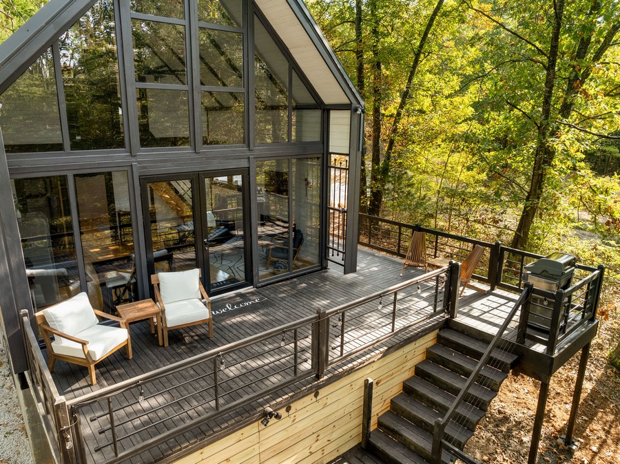 Completed Aries 96 modern A-frame cabin kit in the Arkansas Ozarks