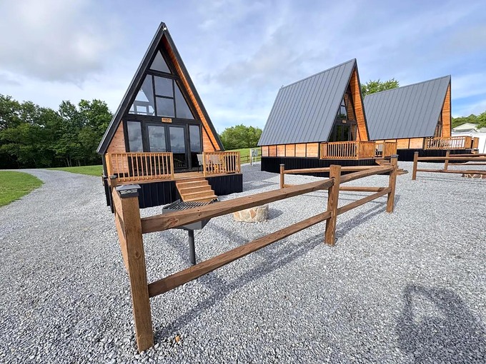 Three completed Stella 70 A-frame cabins at WV ATV Resort in West Virginia