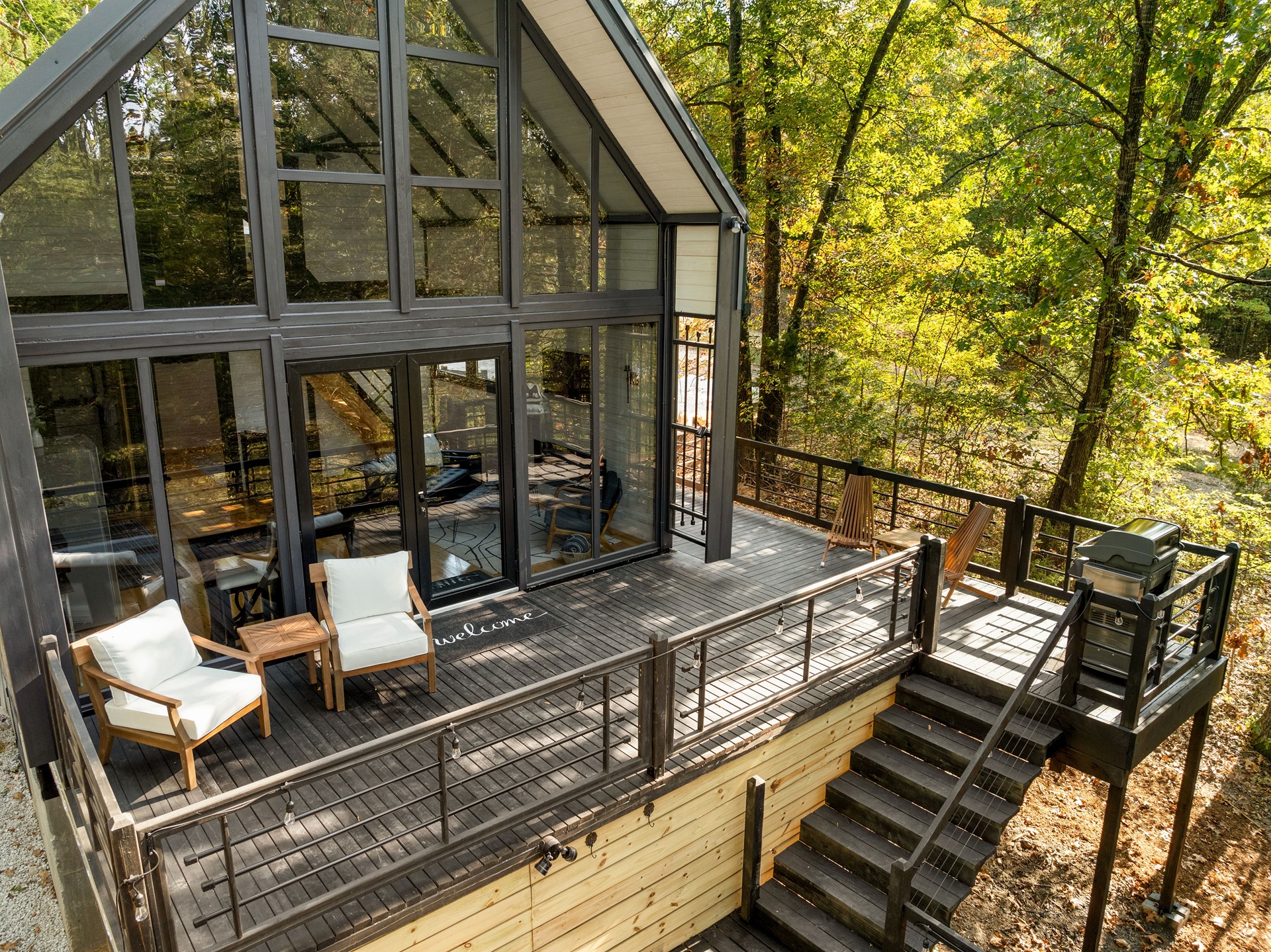 Completed front deck from above at the Aries 96 cabin project in Omaha, Arkansas.