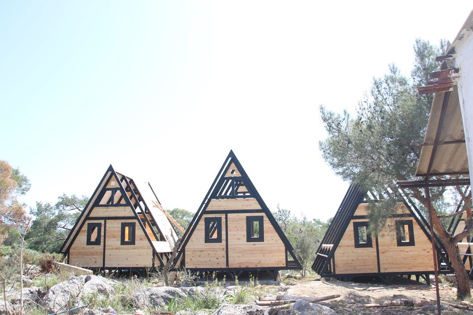 Wall panels and roof work progressing on the Patara cabins.