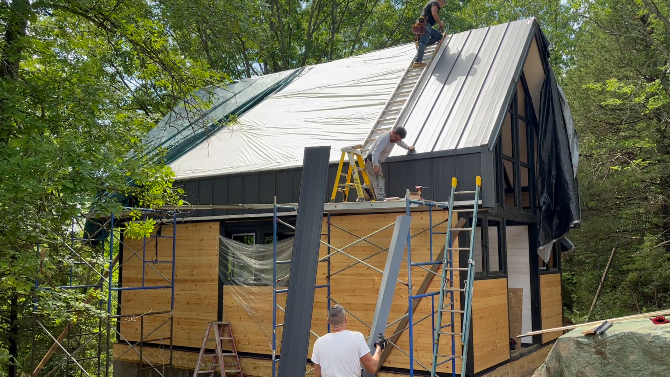 View of standing-seam metal roof during installation on the Arkansas Aries 96 cabin.